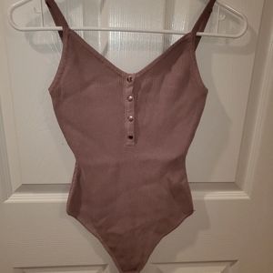Mauve spaghetti strap bodysuit in size large